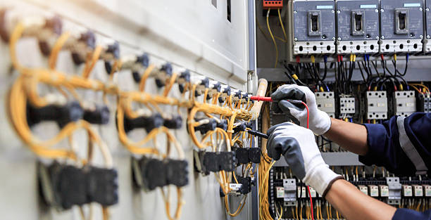 Professional Electrician technician working in Inwood, FL